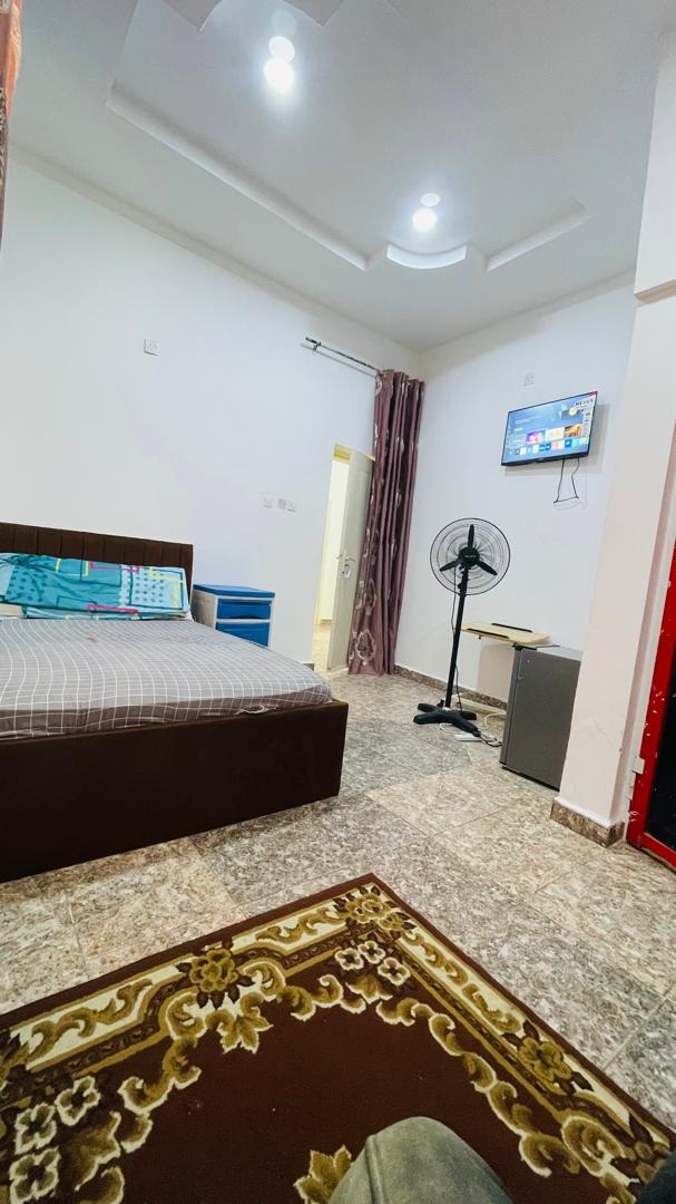 Patient room with wall-mounted television
