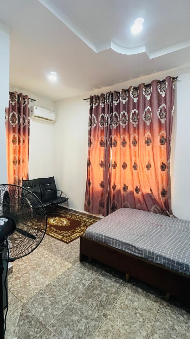 Inpatient ward with air conditioning and bedside fan