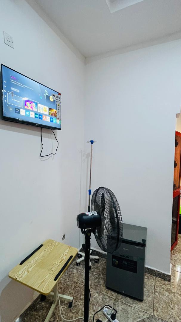 Patient room corner with IV stand