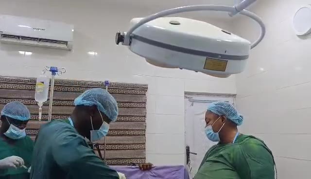 Surgical team at work in the operating theatre