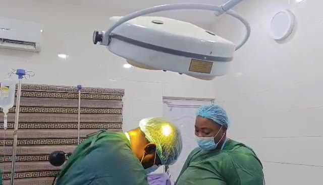 Surgical team at work in the operating theatre